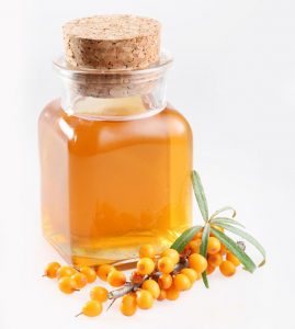 Sea buckthorn oil on a white background